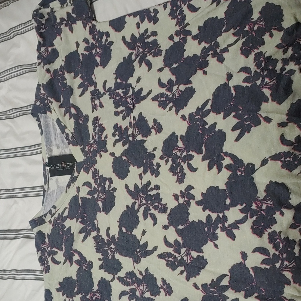 Light green knitted tee with black floral print